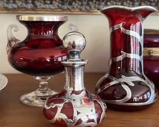 Cranberry cases sterling glass items!
