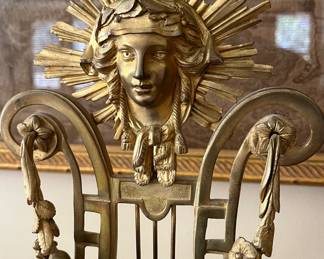 Louis gilt head and rose garland