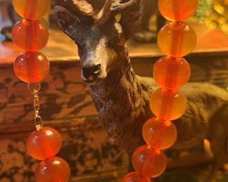 16” strand of antique French amber on a 14K rope chain…$285