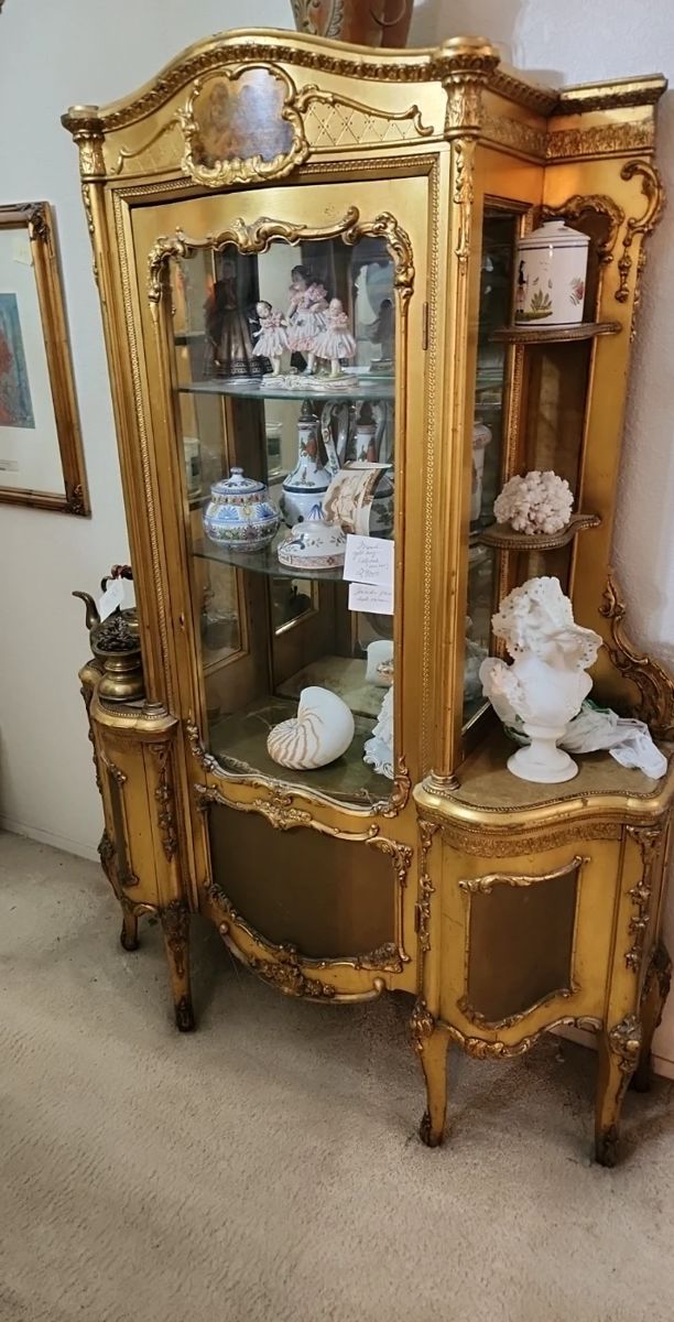 SHOWPIECE CABINET  Perfect for dining room, hallway. Gold leaf from France. Open shelves on each side. Photo inlay on top section. A unique elegant piece!