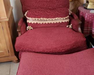 Unusual chair with back rest pillow, foot stool