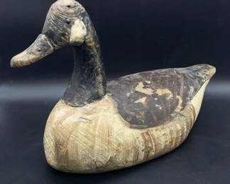 Antique wooden duck decoy display