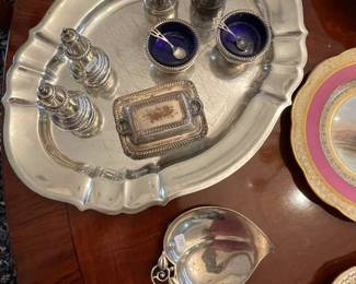 Sterling silver, except the plated toy casserole.