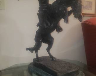 Fredrick Remington bronze.
This one won't blow away!