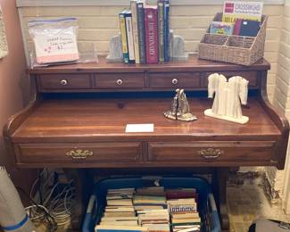 Vintage wood desk, books and bookends 