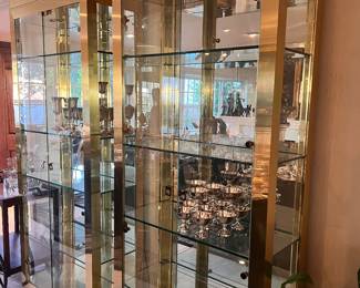 These 2 brass and mirrored glass curio cabs are remarkable!!! They are on line for $11,000!!!!! MINT condition and absolutely timeless style....