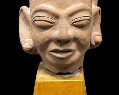 Pre Columbian Style Head On a Wooden Stand
