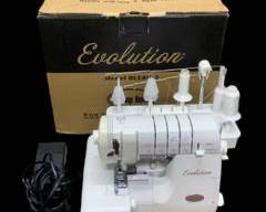 Baby Lock Evolution 8 Thread Serger Sewing Machine Model: BLE8W-2 In Original Packaging!
