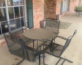 Patio table; 4  "spring" chairs