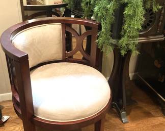 Round seat chair; artificial plant