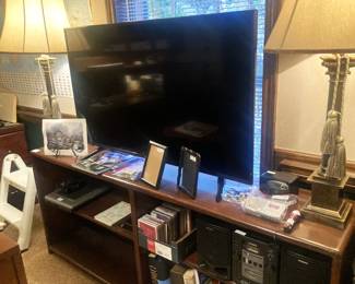 Office credenza;  Hisense TV; lamps