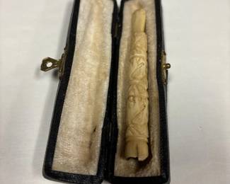Antique pipe stem, with case