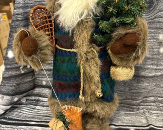 Santa clause figurine, on wood stand