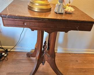 Antique parlor table with marble top