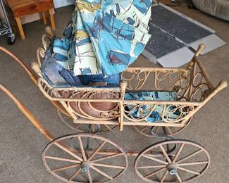 vintage baby carriage with umbrella