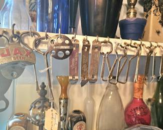 a collection of bottle openers