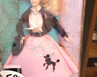 Barbie and about 100 more Barbies