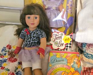 Several dolls, lots of Barbie acessories