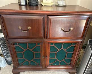 radio cabinet made into storage cabinet