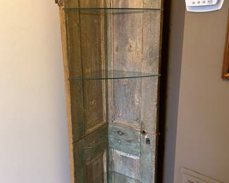 corner shelf made of doors and glass shelves