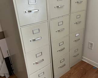 3 metal filing cabinets