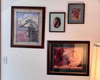 Grouping of Western-style framed prints, largest is 19" x 23"