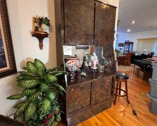 Monumental faux-tortoise burl wood laminate bar cabinet with upper glass storage, mirrored bottle cupbard below, minor wear/chip to laminate - One Piece 7ft 4in H x 4 ft W x 18"D