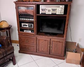 Laminate entertainment center 52"H x 50"W x 21"D