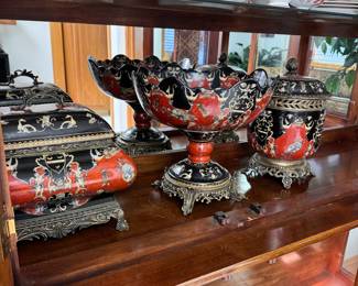 Set of heavy ceramic pieces including a tea chest, jar, and compote, Oriental styling in black and dark reds, compote is 11"H x 12"W