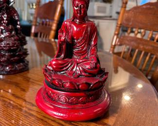 Red resin Buddha figurine 8"H