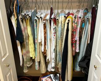 Multitude of quilts, table cloths, knitted items, dvd’s, baskets, Christmas items