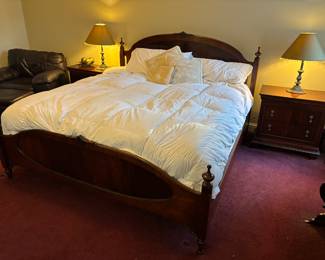 Beautiful bed with matching night stands, pillow top mattress, down comforter