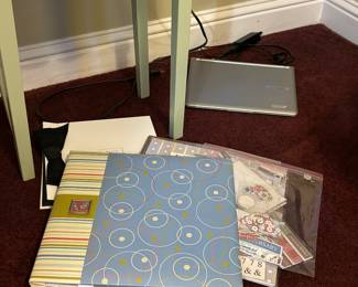 Scrapbook items, laptop computer