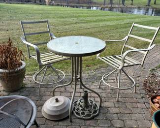 Second patio set (cushions in house), umbrella stands