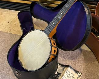 Antique banjo and case musical instrument