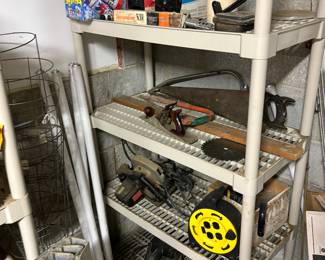 Plastic shelving, extension cords, circular saws, tools
