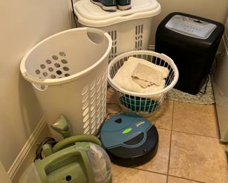 irobot Roomba automatic vacuum, Bissell carpet cleaner, laundry baskets