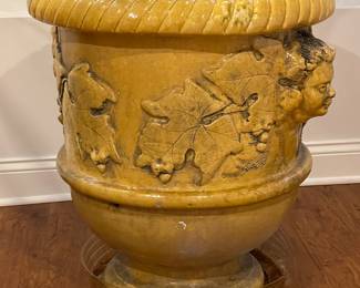 Mike Bell 19th Century Yellow Jardiniere with Putti Face. Measures 28" D x 30" H. Photo 2 of 5.