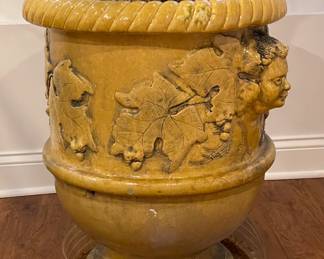 Mike Bell 19th Century Yellow Jardiniere with Putti Face. Measures 28" D x 30" H. Photo 3 of 5.