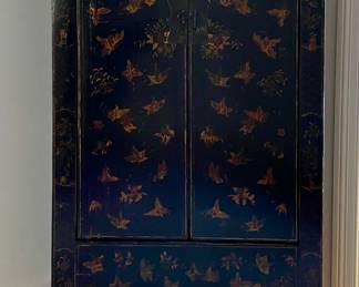 Golden Triangle Sourced Antique Ebonized Elmwood Cabinet with Gilt Butterfly Motif. Measures 33" W x 16" D x 66" H. Photo 1 of 4.