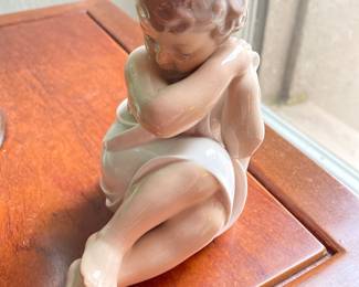 Royal Copenhagen "Rosebud Sleepy Child" Figurine.