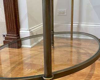 Baker Furniture Style Double Glass Shelf Brass Frame Cocktail Table On Casters. Measures 36" W x 24" D x 20" H. Photo 3 of 3.