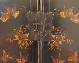 Golden Triangle Sourced Antique Ebonized Elmwood Cabinet with Gilt Butterfly Motif. Measures 33" W x 16" D x 66" H. Photo 2 of 4.