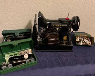 Very clean Singer Featherweight 221 sewing machine with accessories 