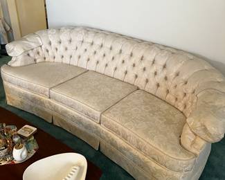 Curved tufted, vintage sofa $75