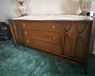 SOLD- Broy Hill Brasília sideboard. Three drawers, two side storage. Original brass pools, sculpted, wood opens side cabinets. No damage. 
$750
