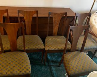 made a North Carolina. C. 1962 BroyHill furniture company. 1 armed chairs, 5 armless chairs. Boat shaped back, original upholstery. Excellent condition. $1800 For a set of six