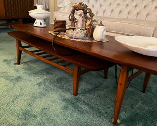 Mid-century, modern Lane Acclaim Series, two-tier swivel Pivot coffee table. 
$900
Available for purchase now. Pick up only. 
Dimensions 52”W closed, 80” W Open
20” W, 18” D, 14” H