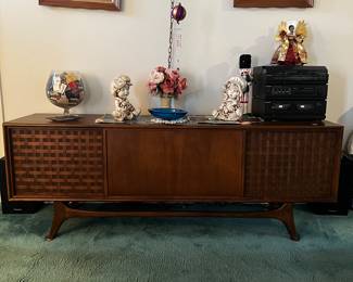 SOLD-Working AM/FM radio and record player Cabinet. Small 2” water stain on the top.
$850, available for purchase now. Pick up only. 
Dimensions: 72” W, 19” D, 26” H
