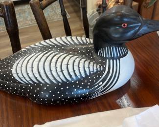 Hand carved and painted. You need it.